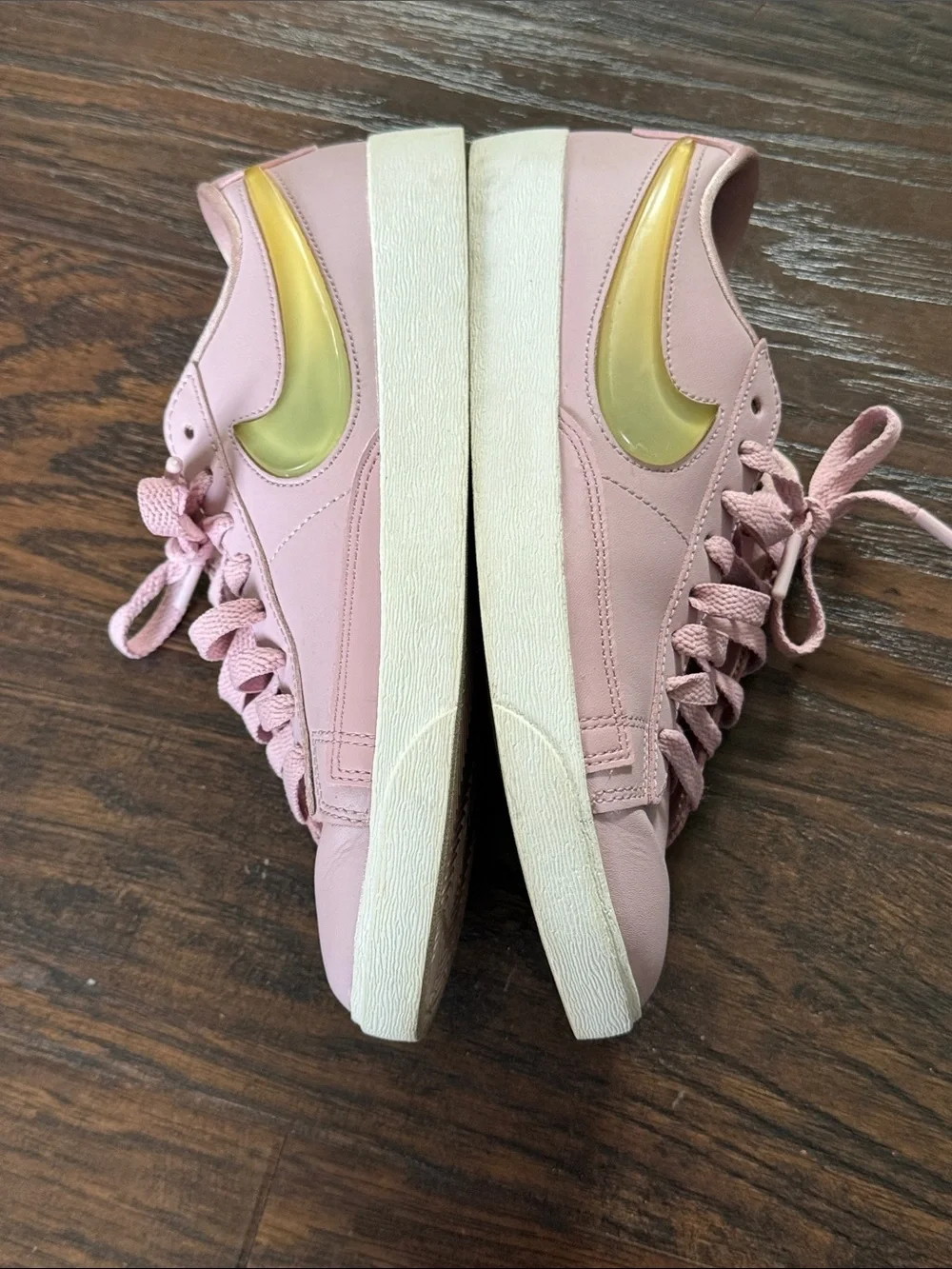 Nike Women's Blush Pink Low-Top Leather Sneakers with Metallic Gold Swoosh